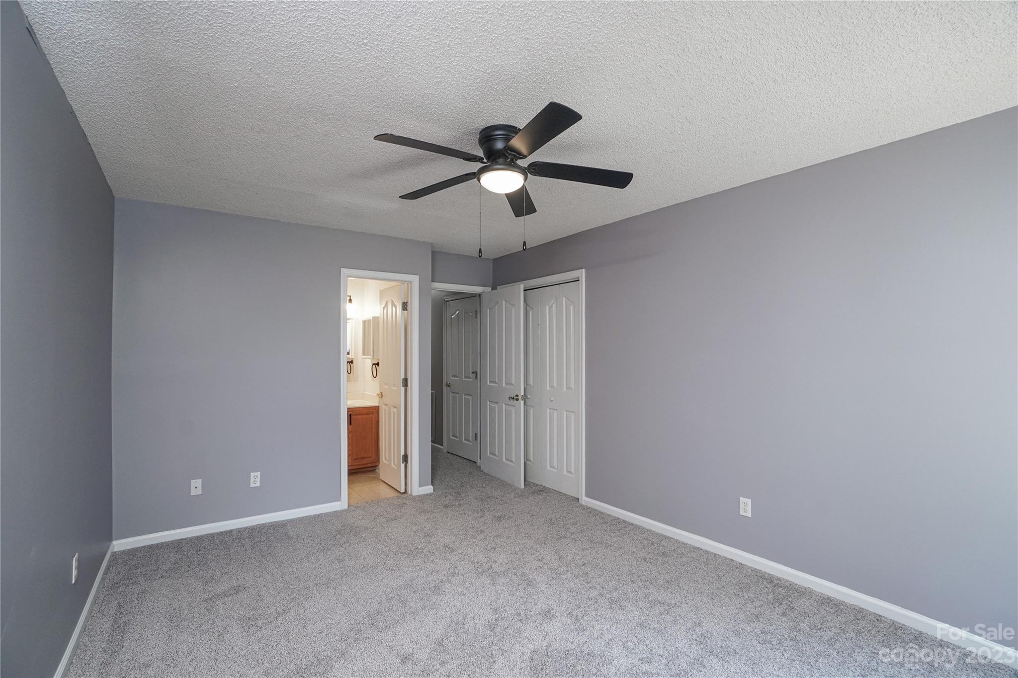 520 Jacobs Ridge Fort Mill, SC 29715 - Photo 18 of 33 a view of a room with an empty space and a ceiling fan