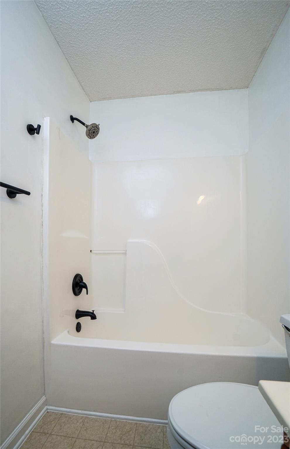 520 Jacobs Ridge Fort Mill, SC 29715 - Photo 22 of 33 a bathroom with a bathtub and a toilet