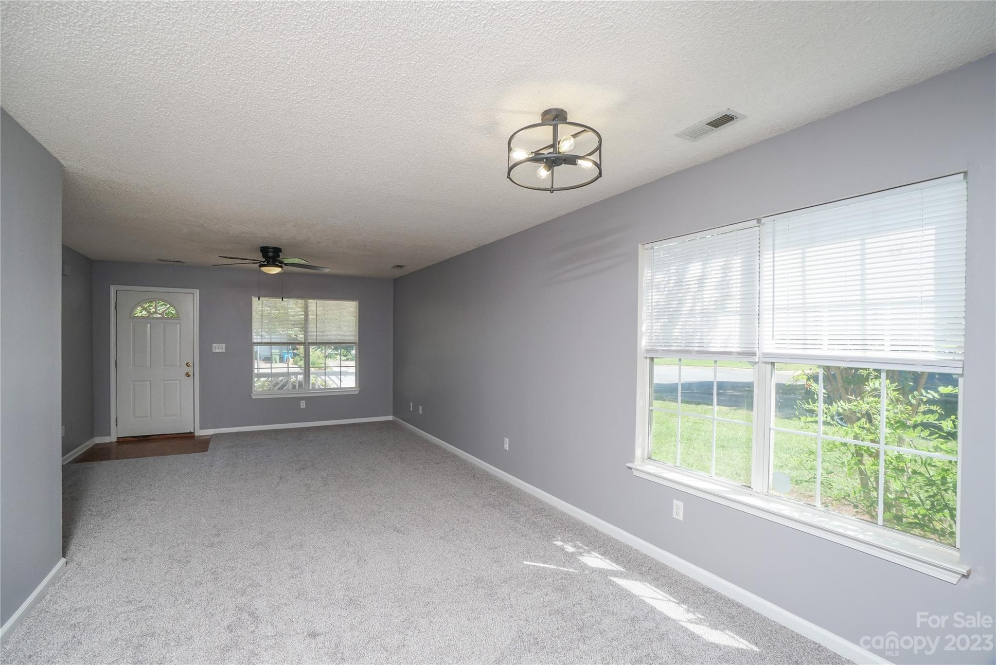 520 Jacobs Ridge Fort Mill, SC 29715 - Photo 27 of 33 an empty room with windows and closet