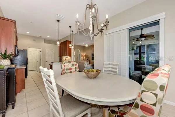 a very nice looking dining room with a table and chairs