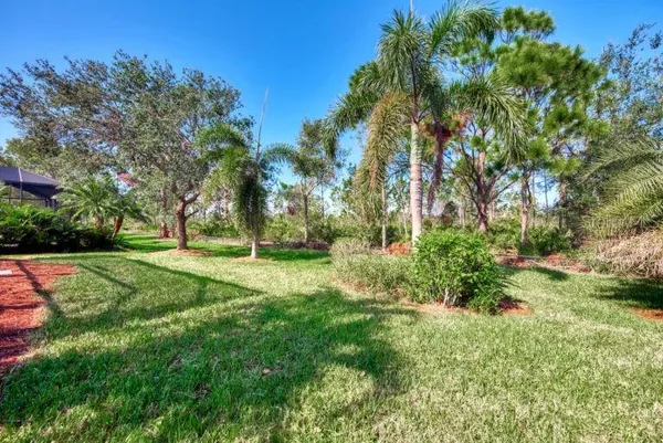 a view of backyard with green space
