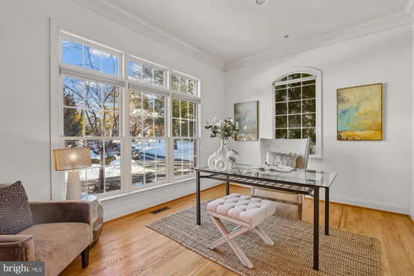 a kitchen with kitchen island granite countertop appliances and cabinets