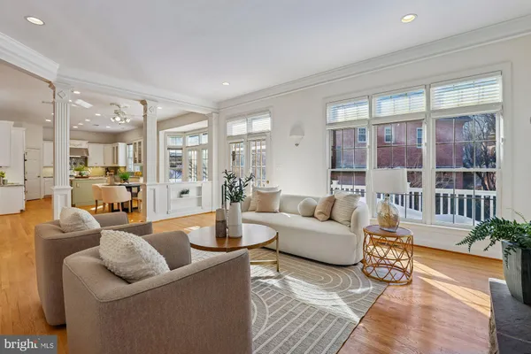 a view of staircase with white walls and a window
