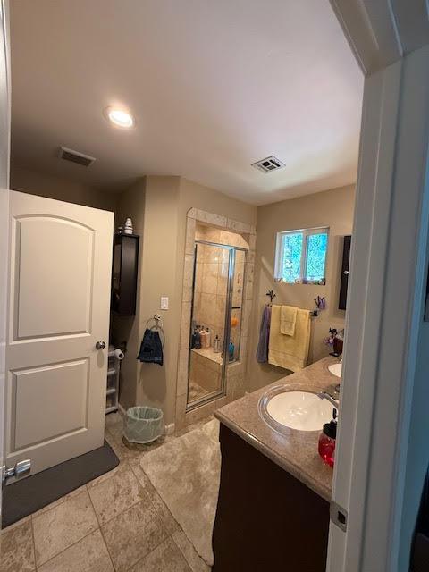 5827 Lookout Court Murphys, CA 95247 - Photo 13 of 21 a en suite bathroom with a granite countertop sink and a mirror