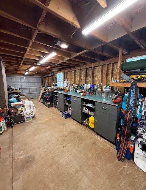 5827 Lookout Court Murphys, CA 95247 - Photo 20 of 21 a view of a storage room with furniture and a garage