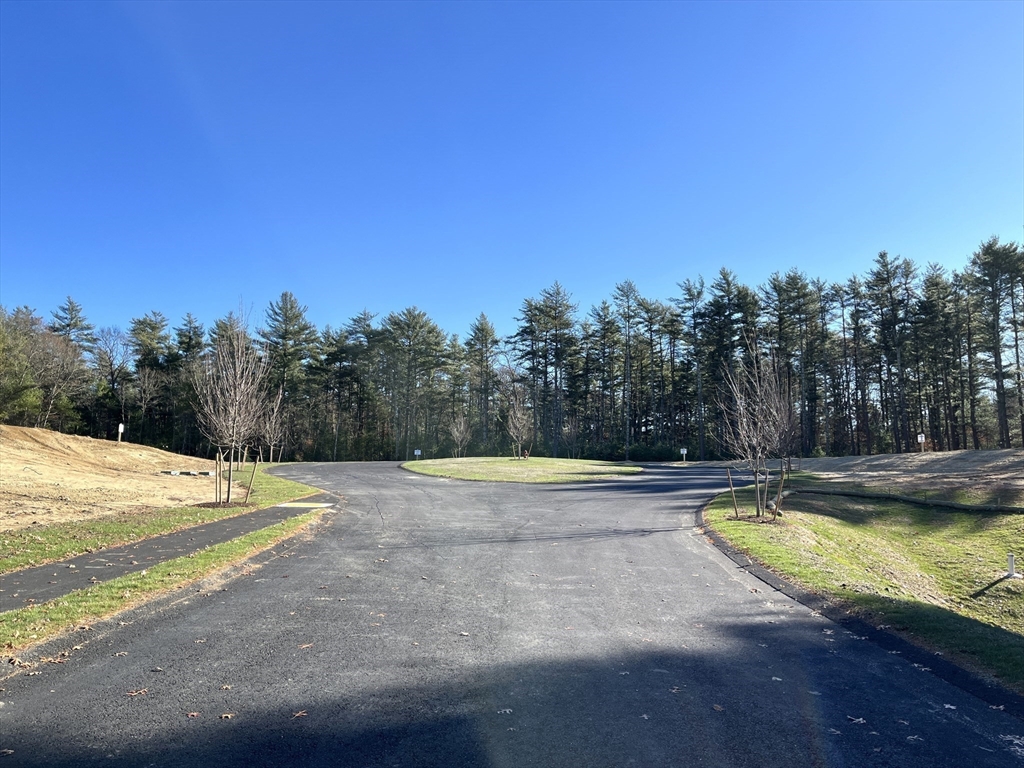 5 Ohana Way Carver, MA 02330 - Photo 2 of 10 a view of a swimming pool and an outdoor space