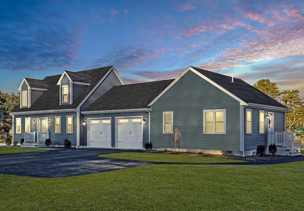 5 Ohana Way Carver, MA 02330 - Photo 10 of 10 a front view of a house with a garden