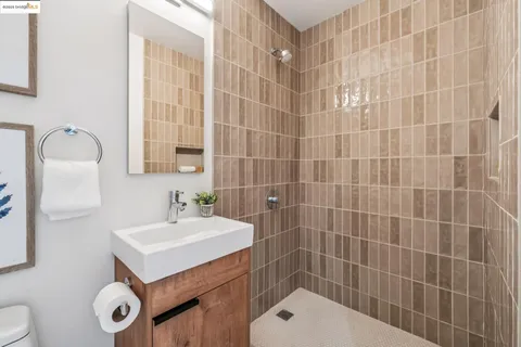 a view of a bedroom with washer and dryer