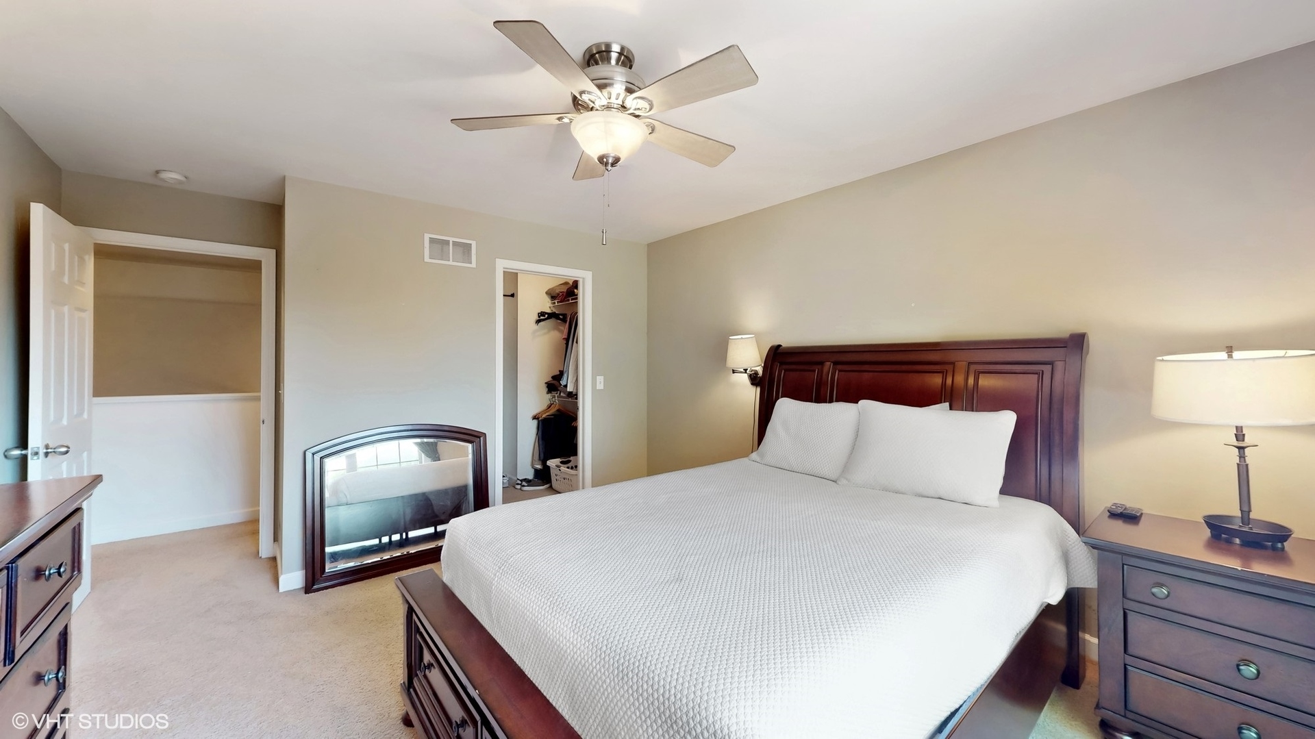 11415 Sisters Court, Unit 11415 Huntley, IL 60142 - Photo 17 of 32 a bedroom with a bed and a lamp on dresser