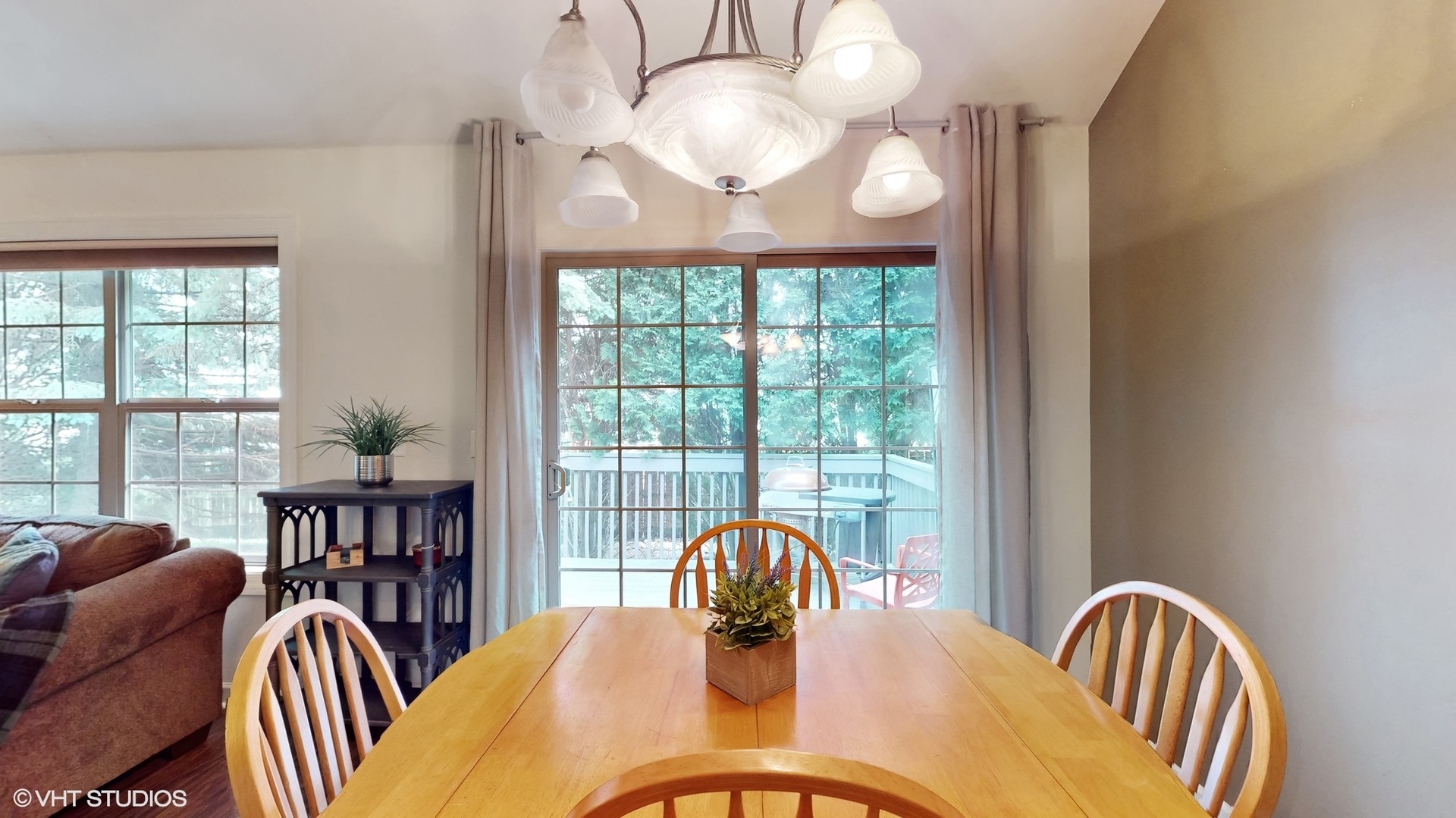 11415 Sisters Court, Unit 11415 Huntley, IL 60142 - Photo 9 of 32 a view of a dining room with furniture window and outside view