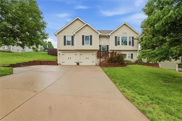 $325,000 | 210 Whispering Hills Boulevard, Lone Jack, MO 64070