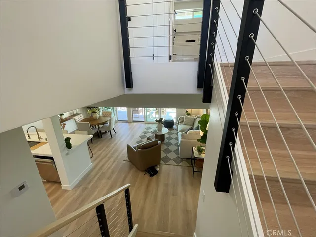 a view of living room with furniture and rug
