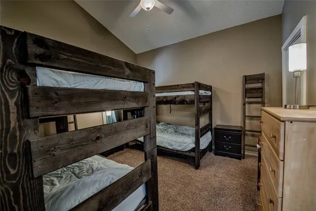 a bedroom with bunk bed