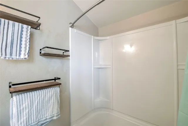 a view of a hallway with entryway