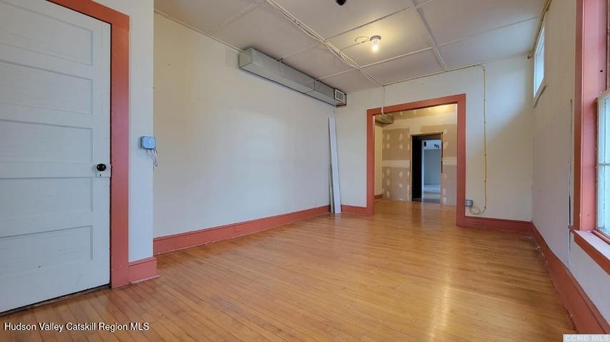2948 County Rte 9 East Chatham, NY 12060 - Photo 12 of 32 a view of an empty room with closet and wooden floor