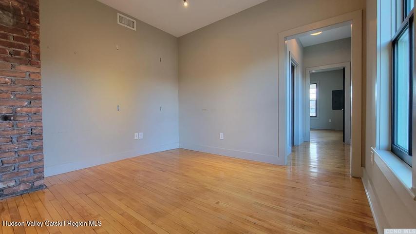 2948 County Rte 9 East Chatham, NY 12060 - Photo 16 of 32 a view of a hallway with wooden floor
