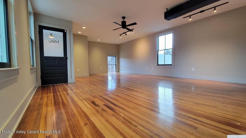 2948 County Rte 9 East Chatham, NY 12060 - Photo 21 of 32 wooden floor in an empty room with a window