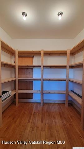 2948 County Rte 9 East Chatham, NY 12060 - Photo 24 of 32 a view of walk in closet with empty racks