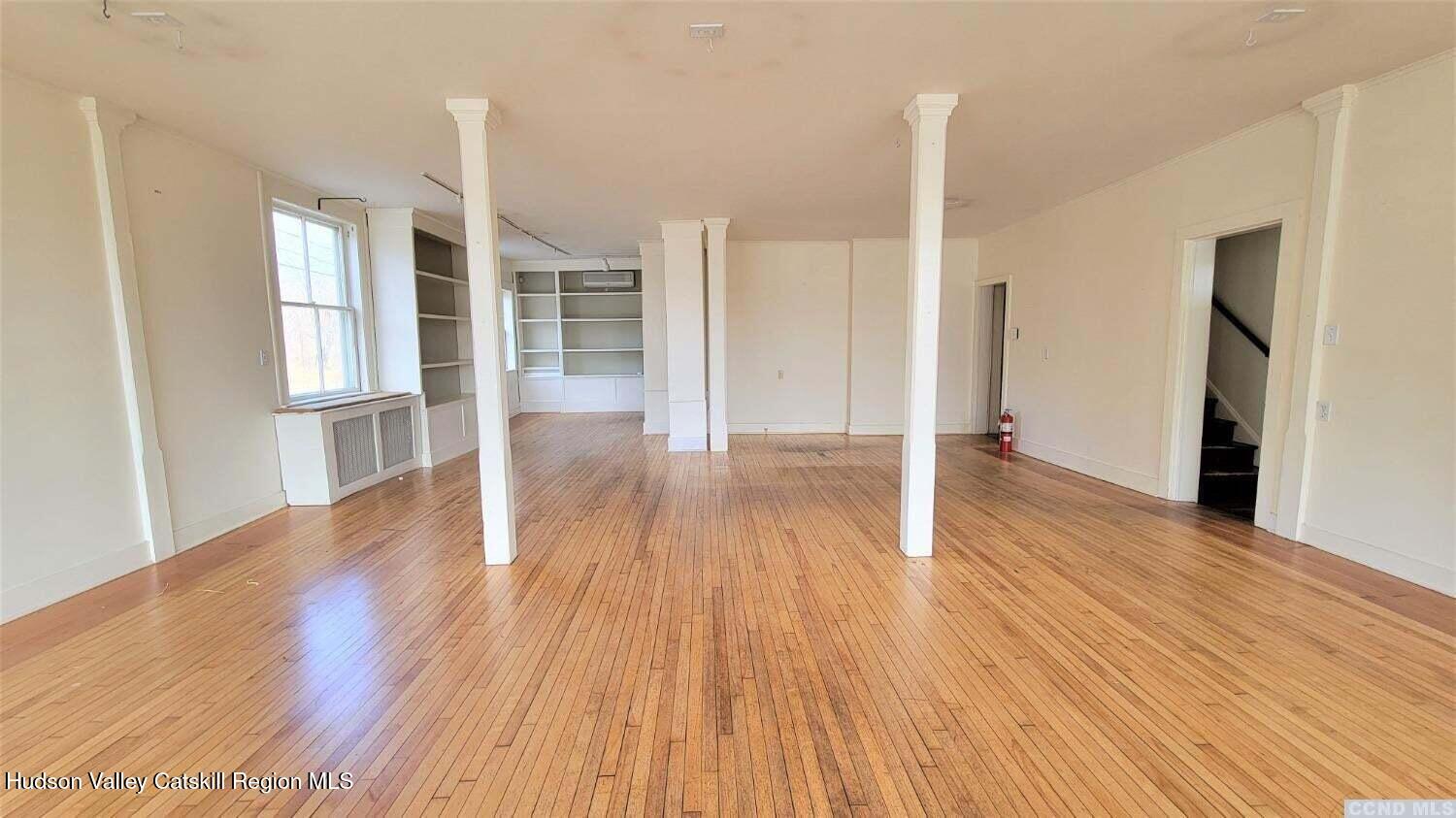 2948 County Rte 9 East Chatham, NY 12060 - Photo 7 of 32 a view of empty room with wooden floor and window