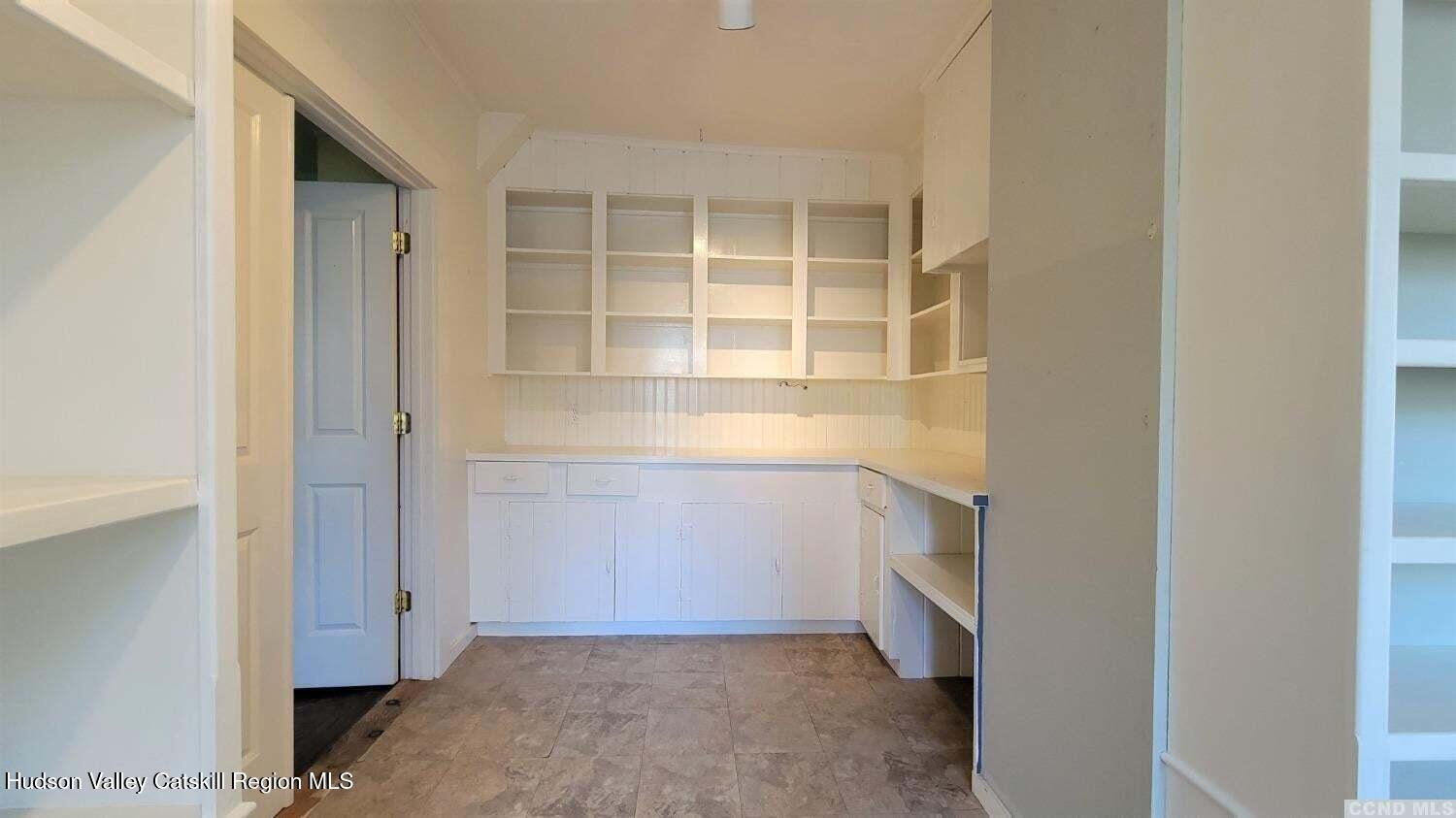 2948 County Rte 9 East Chatham, NY 12060 - Photo 9 of 32 a view of an empty walk in closet