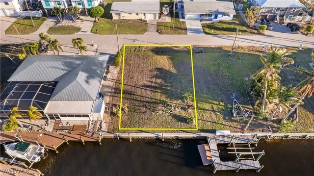a view of swimming pool with outdoor seating and a patio