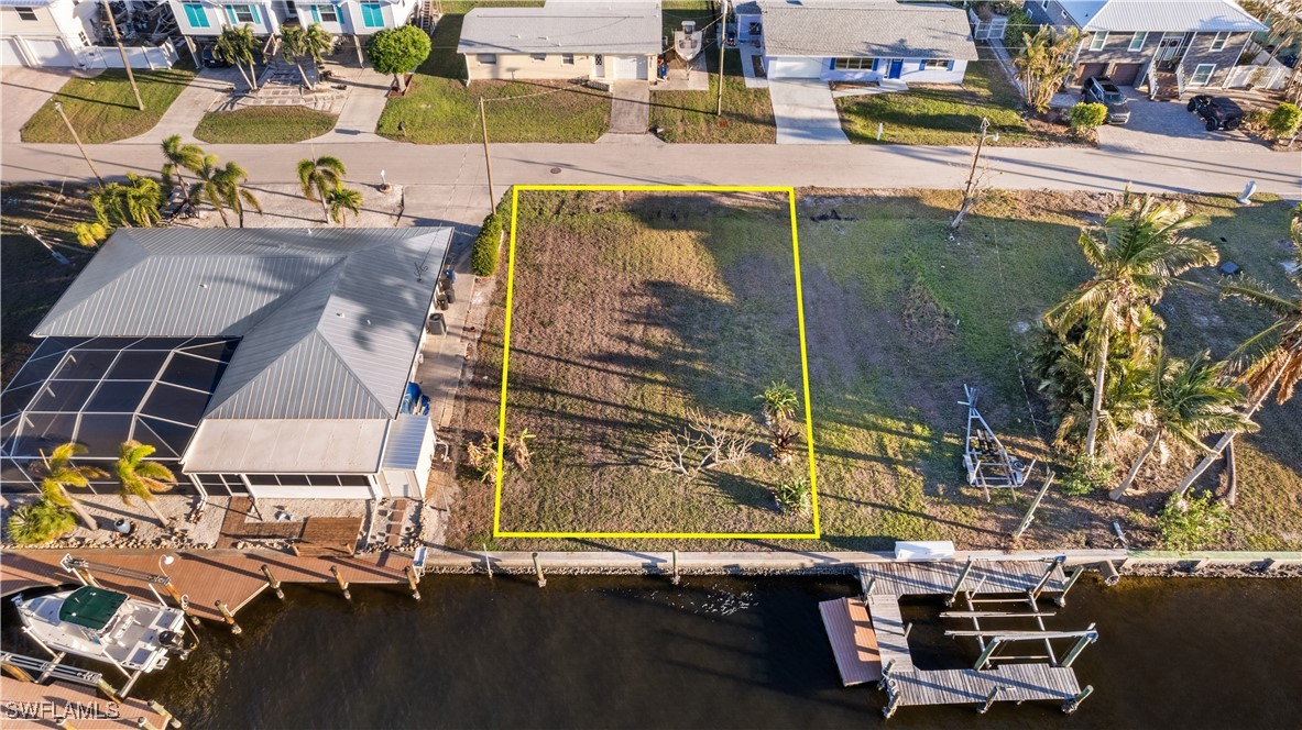 2656 Clyde Street Matlacha, FL 33993 - Photo 3 of 10 a view of swimming pool with outdoor seating and a patio