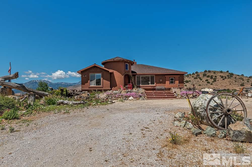 15850 Rocky Vista Road Reno, NV 89521 - Photo 1 of 40 a front view of a house with a yard