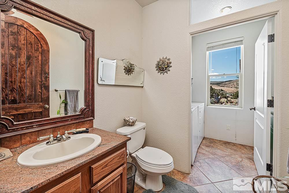 15850 Rocky Vista Road Reno, NV 89521 - Photo 11 of 40 a bathroom with a sink and a mirror