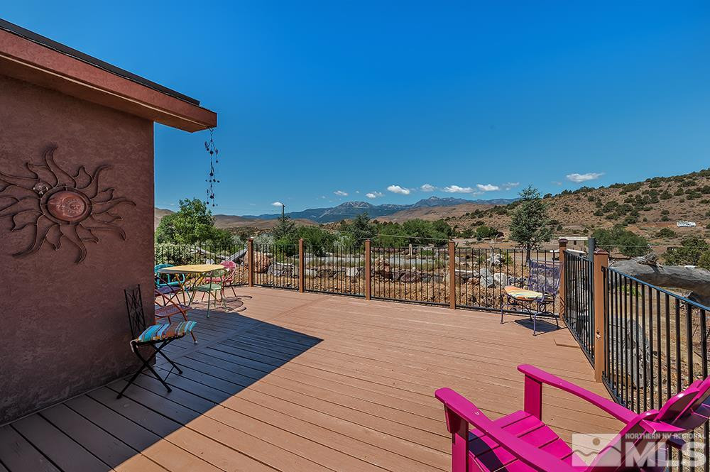 15850 Rocky Vista Road Reno, NV 89521 - Photo 18 of 40 a view of a balcony with chairs
