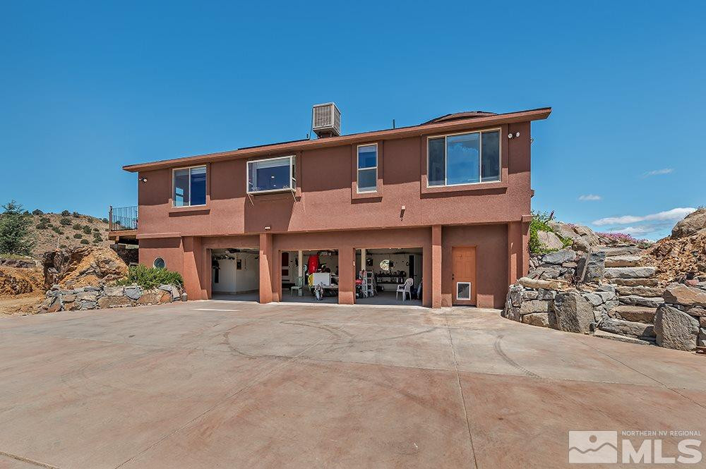15850 Rocky Vista Road Reno, NV 89521 - Photo 2 of 40 a view of a house with a outdoor space
