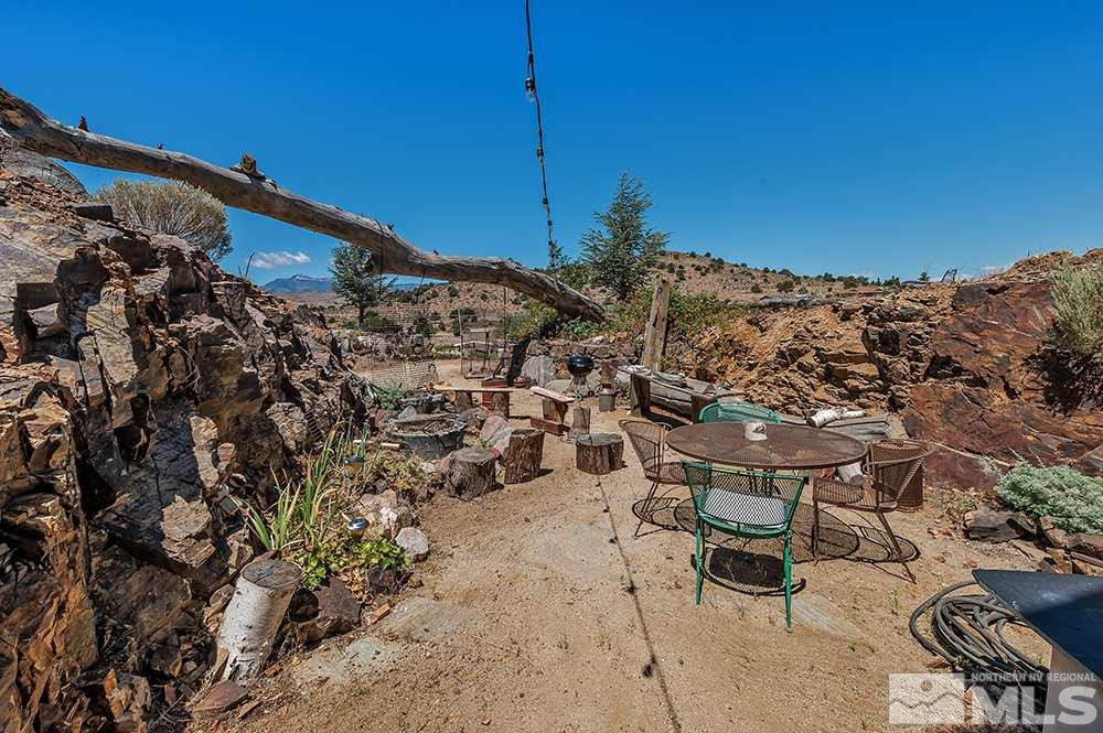 15850 Rocky Vista Road Reno, NV 89521 - Photo 24 of 40 a view of a terrace with a bench
