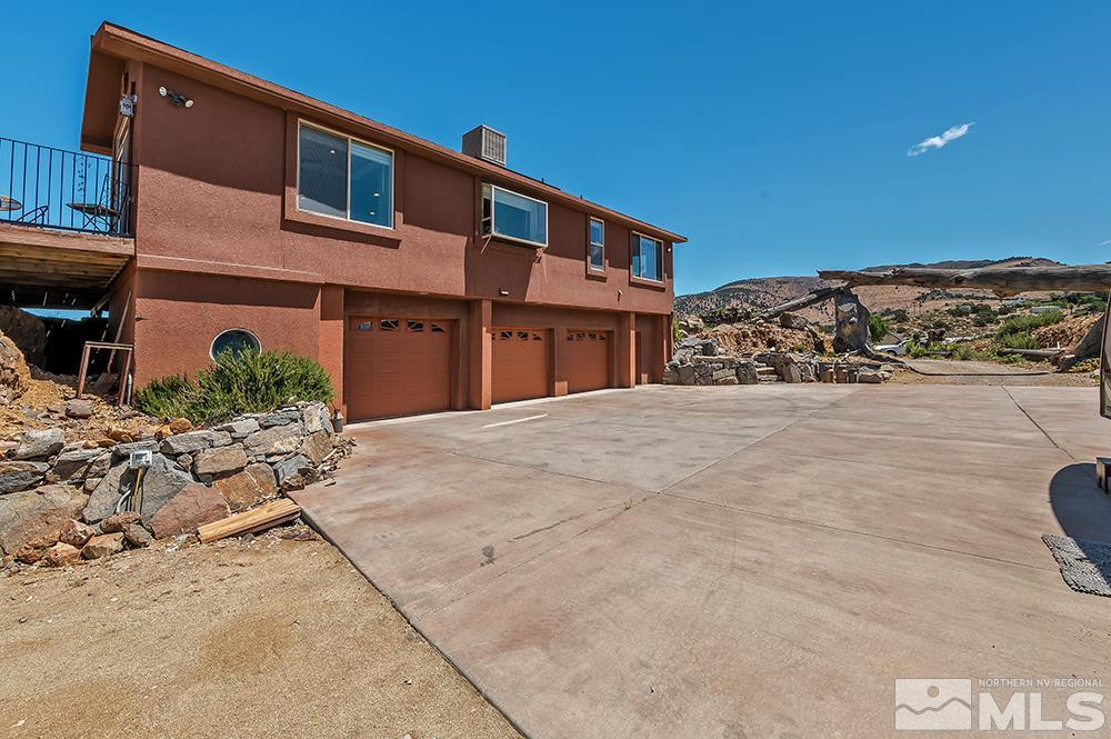 15850 Rocky Vista Road Reno, NV 89521 - Photo 27 of 40 a front view of a house with a yard