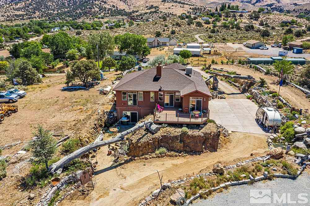 15850 Rocky Vista Road Reno, NV 89521 - Photo 40 of 40 an aerial view of a house with a yard and lake view