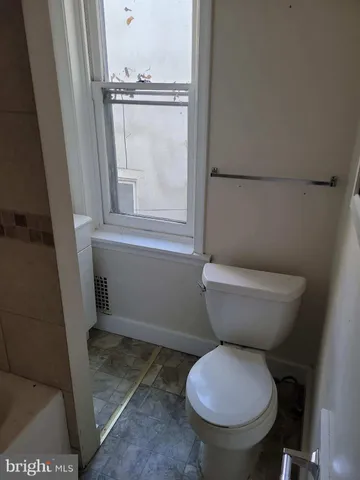 a bathroom with a toilet