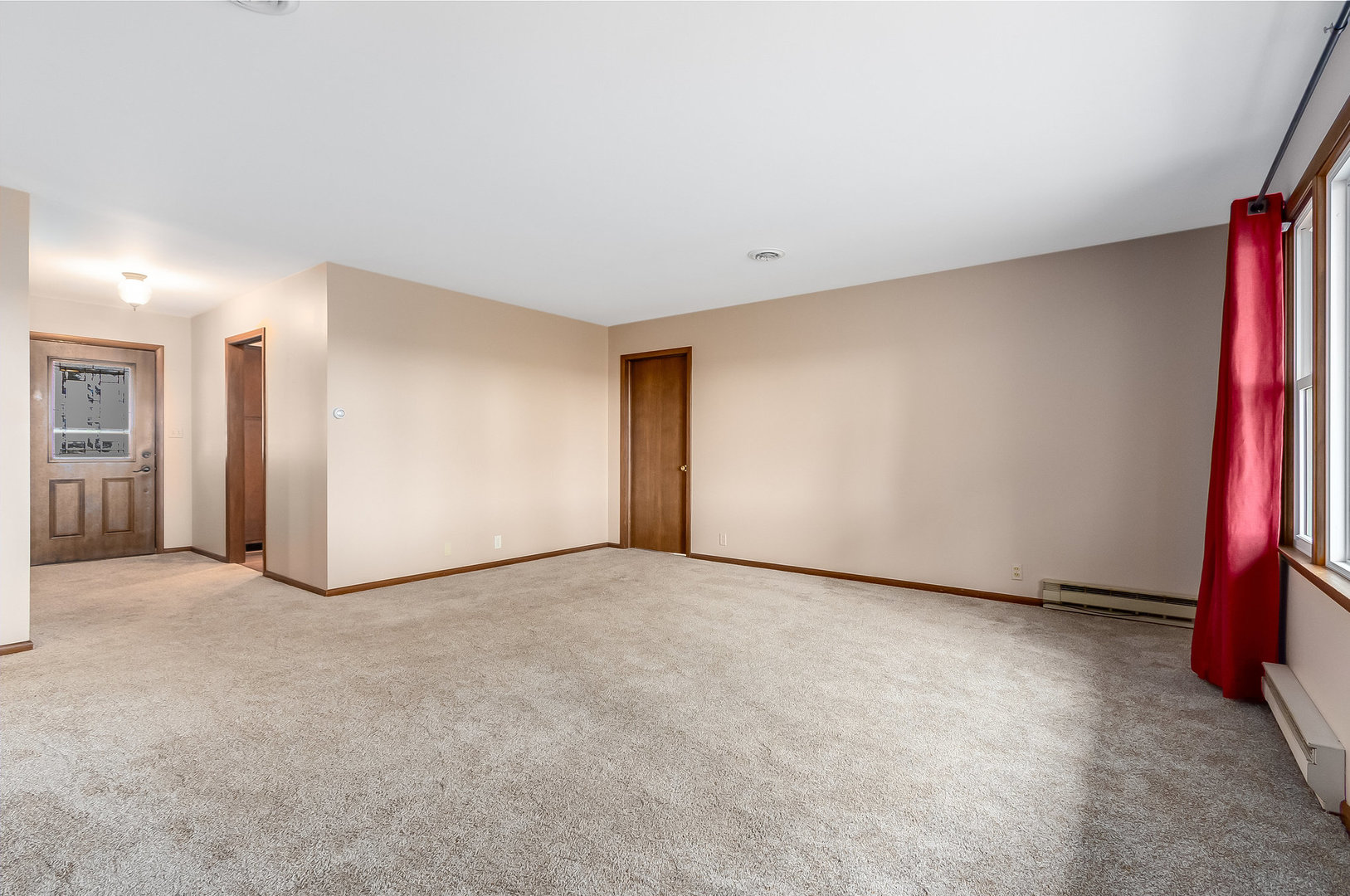 14255 Grove Road Minooka, IL 60447 - Photo 6 of 38 a view of an empty room with a window