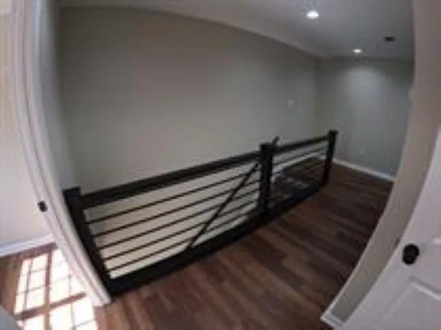 a view of an empty room and window