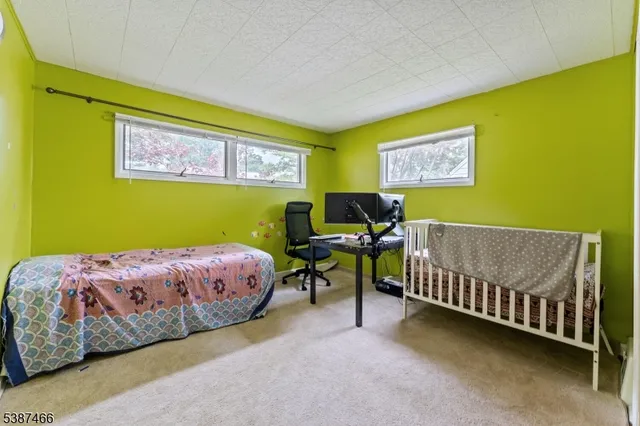 a bedroom with a bed and furniture