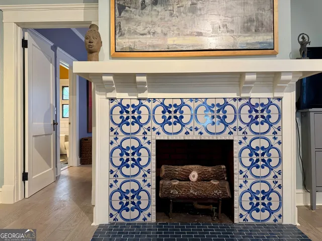 a kitchen with stainless steel appliances a sink a stove and cabinets