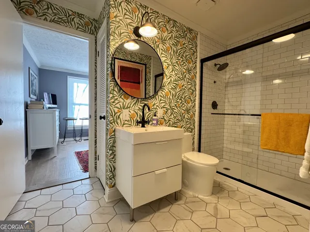 a bathroom with a sink and a window