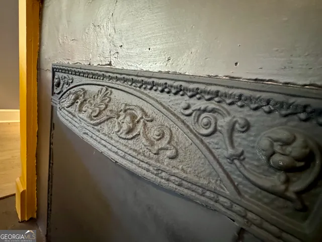 a living room with furniture gym equipment and a view of living room