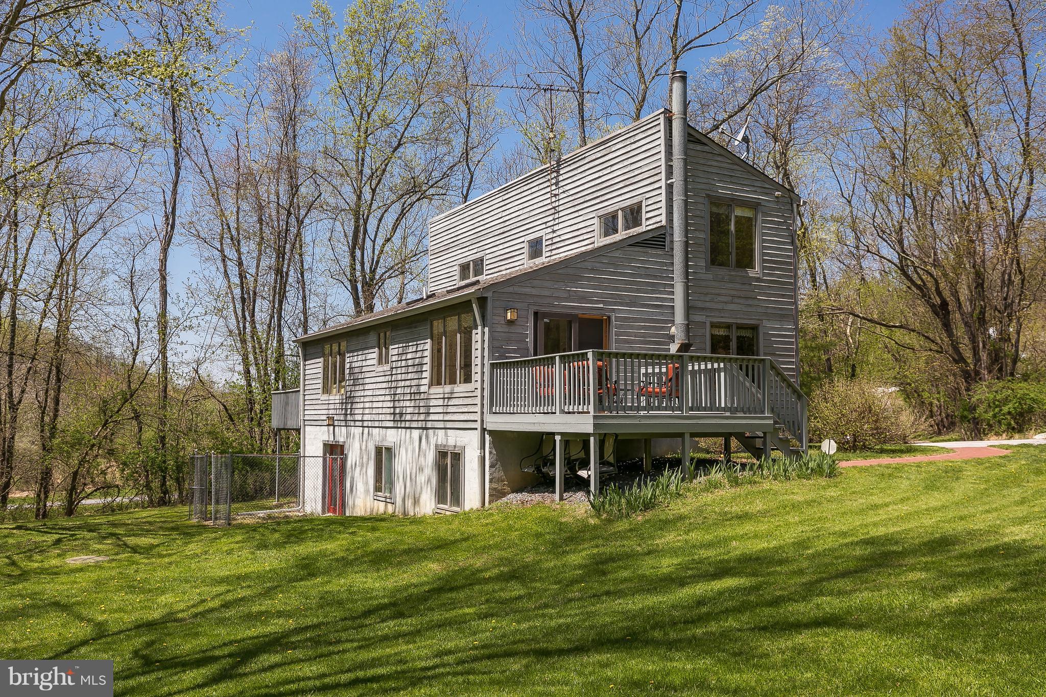 1801 Blue Mt Road Monkton, MD 21111 - Photo 1 of 30 a front view of a house with a garden