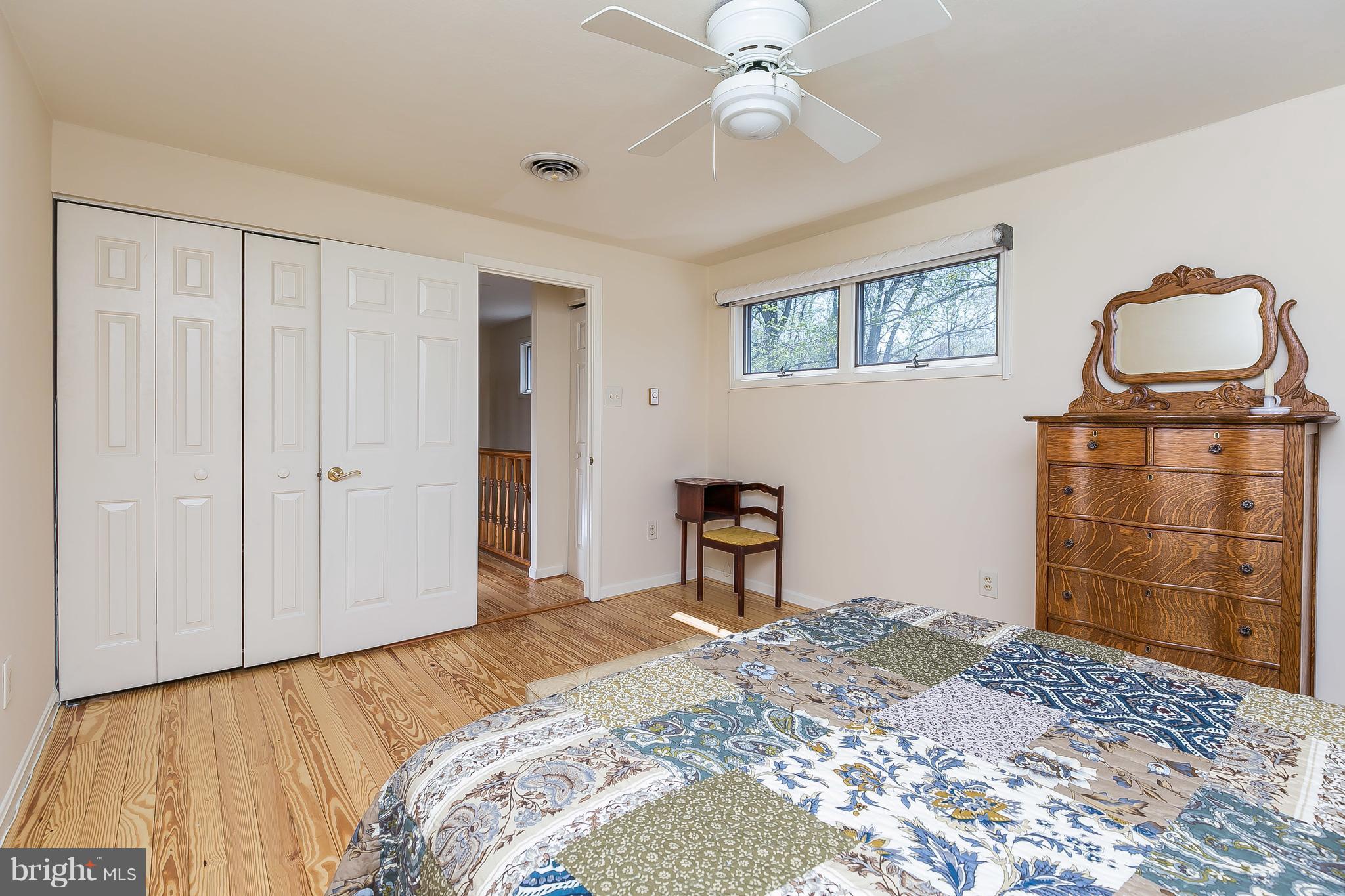 1801 Blue Mt Road Monkton, MD 21111 - Photo 16 of 30 a bedroom with a bed and a dresser