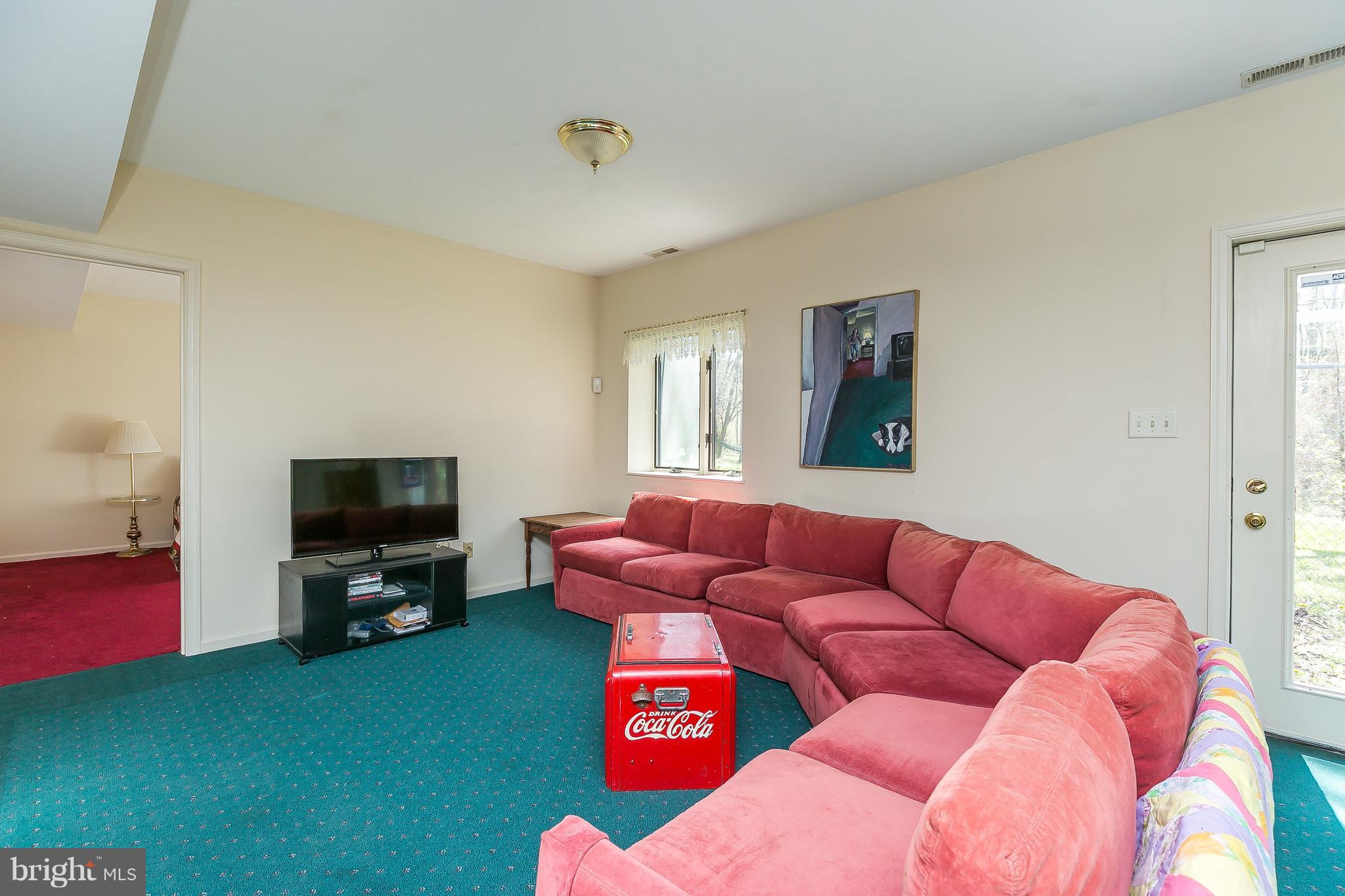 1801 Blue Mt Road Monkton, MD 21111 - Photo 23 of 30 a living room with furniture and a flat screen tv