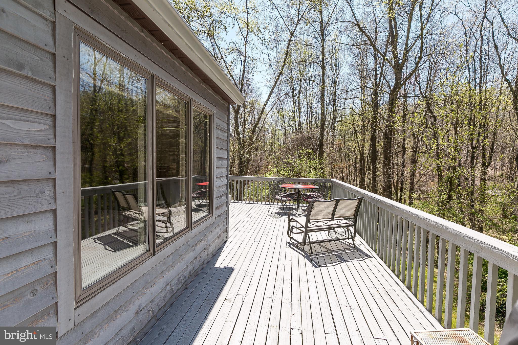 1801 Blue Mt Road Monkton, MD 21111 - Photo 25 of 30 a view of a balcony with wooden floor and fence