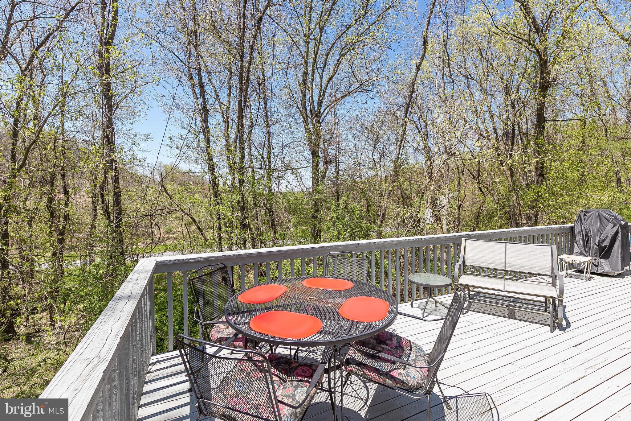 1801 Blue Mt Road Monkton, MD 21111 - Photo 26 of 30 a balcony with wooden floor and furniture