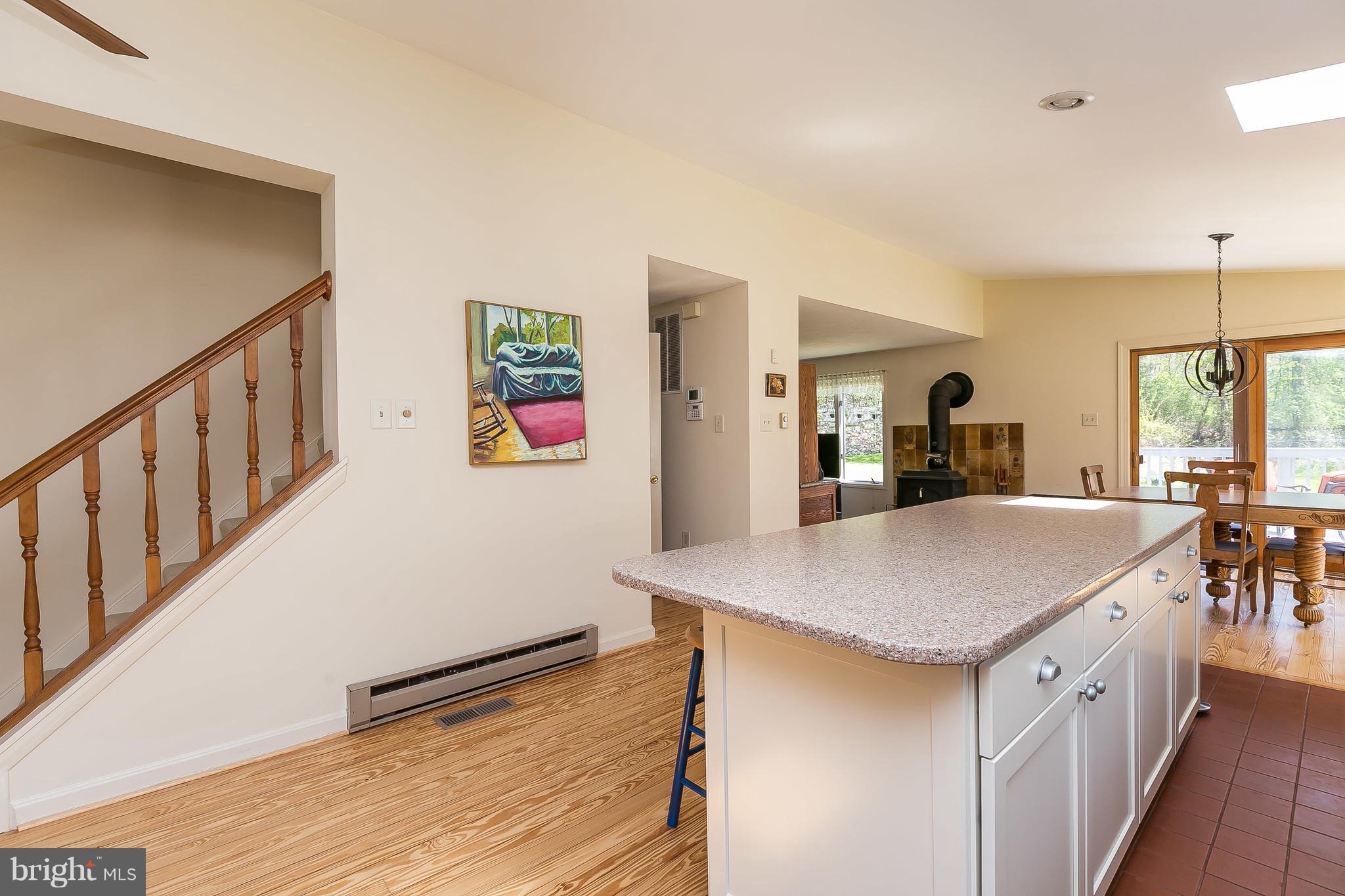 1801 Blue Mt Road Monkton, MD 21111 - Photo 4 of 30 a view of kitchen island with furniture and wooden floor