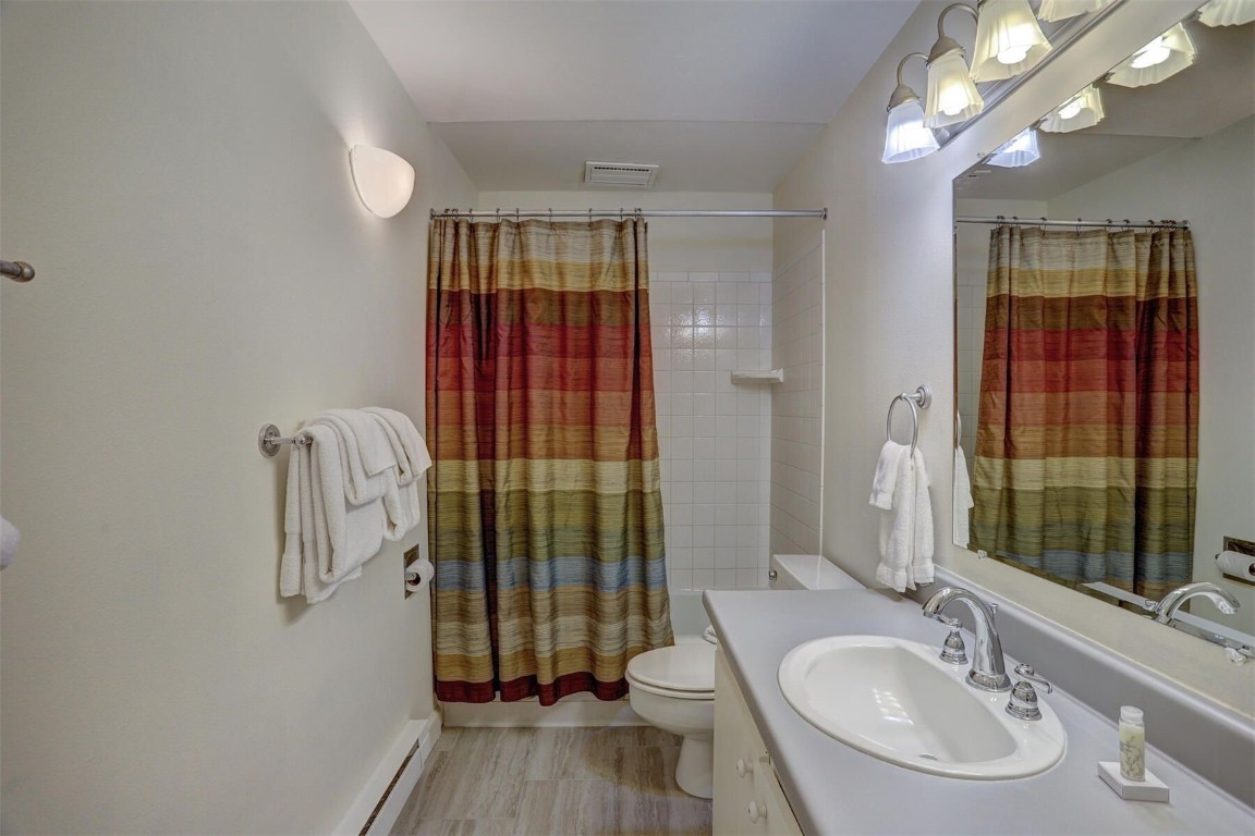 965 4 O Clock Road Breckenridge, CO 80424 - Photo 26 of 32 a bathroom with a sink and a mirror