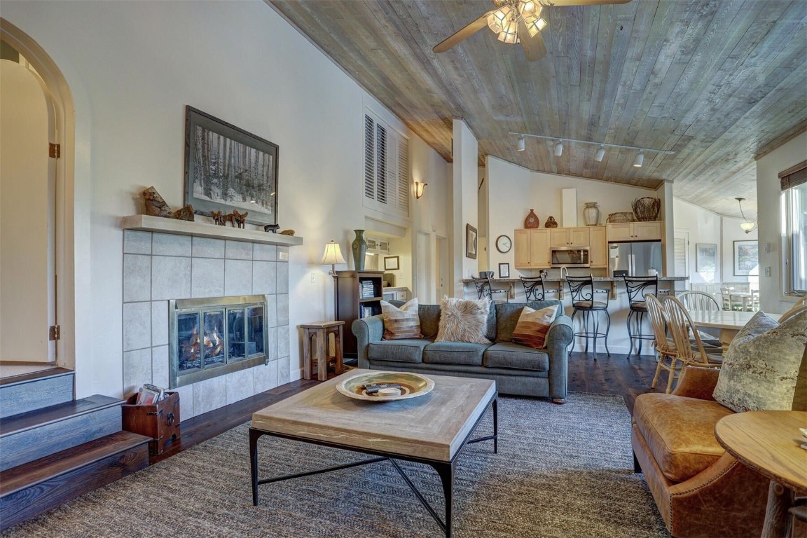 965 4 O Clock Road Breckenridge, CO 80424 - Photo 6 of 32 a living room with furniture and a fireplace