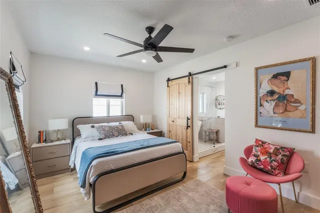 a view of a backyard with sitting area