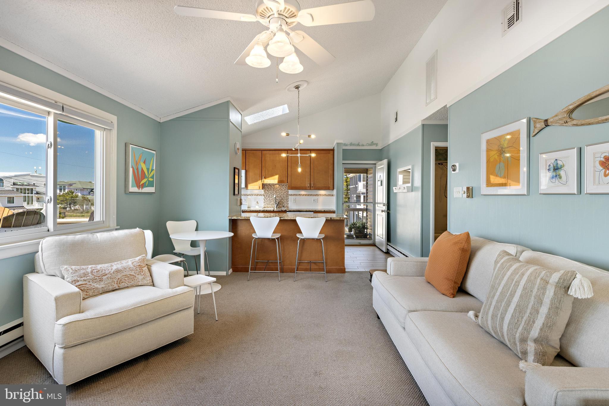 24 Joan Road Long Beach Township, NJ 08008 - Photo 6 of 55 a living room with furniture and a large window